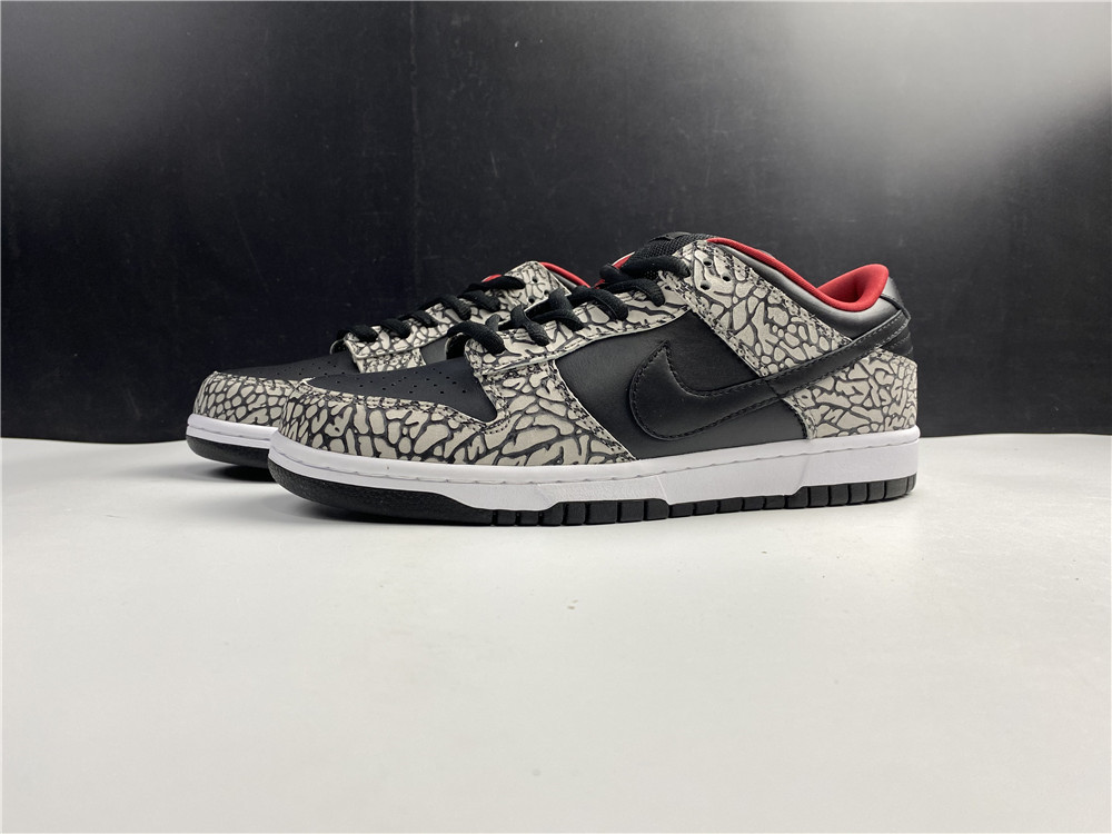 from Supreme × Nike SB Dunk Low “Black Cement 304292-131